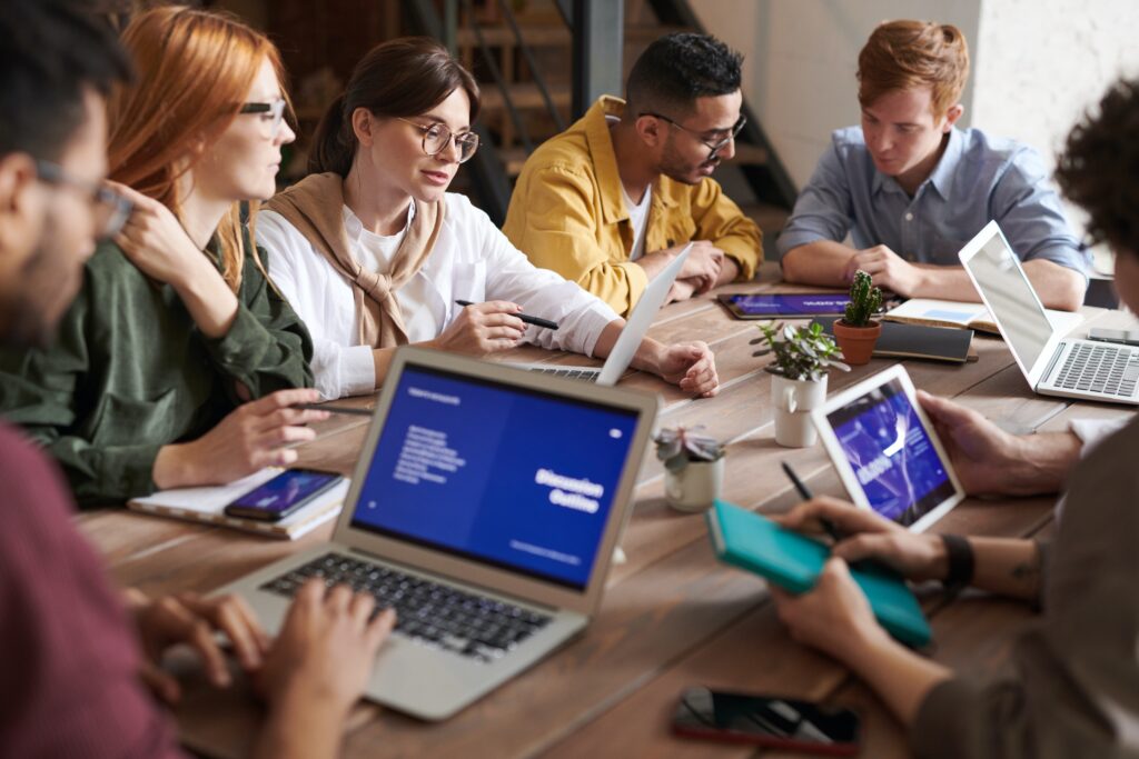 Multiple members working together on a table